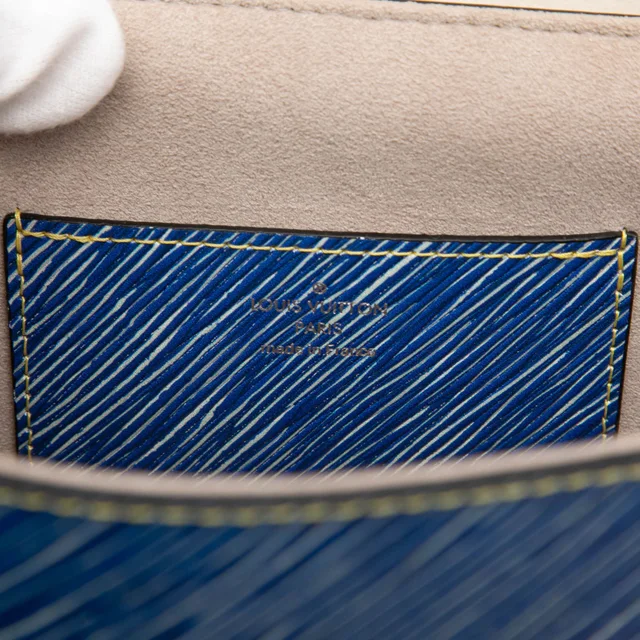 Blue Louis Vuitton Epi Denim Azteque Twist MM Crossbody Bag in Blue Denim from Designer Revival, photo 2 of 2