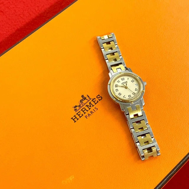 Hermès Clipper Stainless Steel Quartz Watch Wristwatch Silver Gold in Gold from The Reluxe