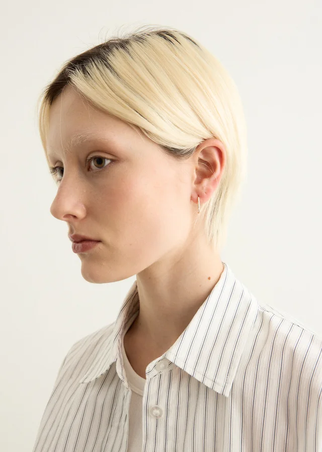 Incu Collection Gold Half Hoop Earrings in Metallic from Incu, photo 1 of 1