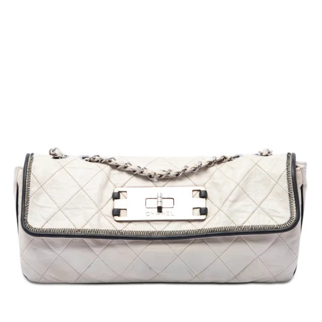 White Chanel Quilted Lambskin East West Mademoiselle Flap Shoulder Bag in White Lambskin from Designer Revival