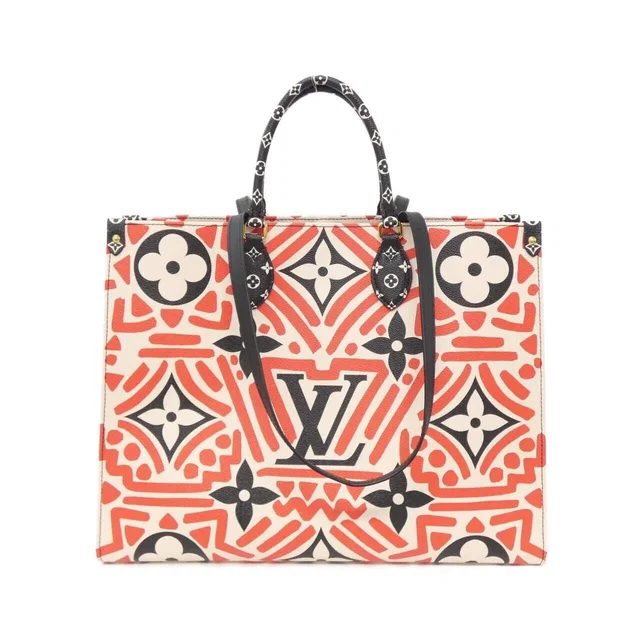 Louis Vuitton Crafty On The Go GM in Coated canvas from The Reluxe