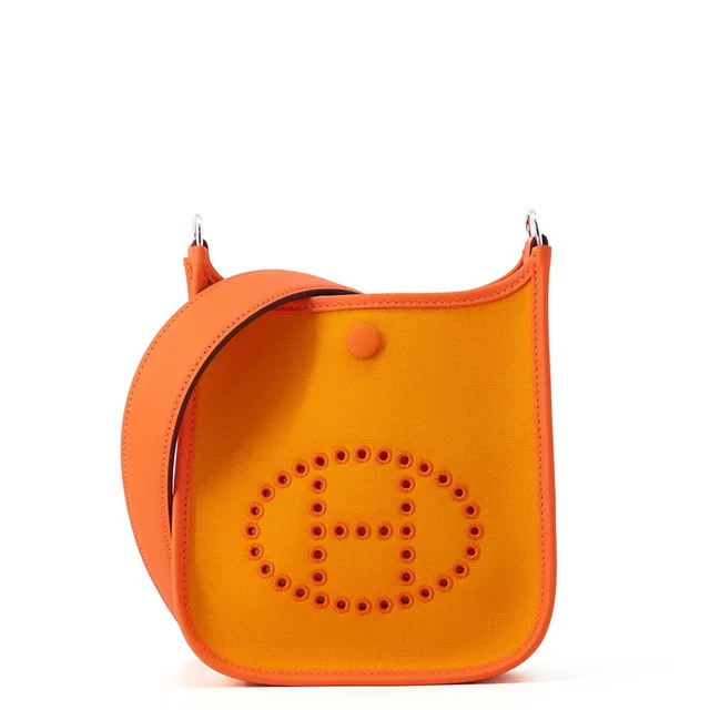 Hermès Neo Evelyne Jaune d'or/Feu Toile Officier Swift Leather Size TPM in Orange Swift leather from GALLERY RARE