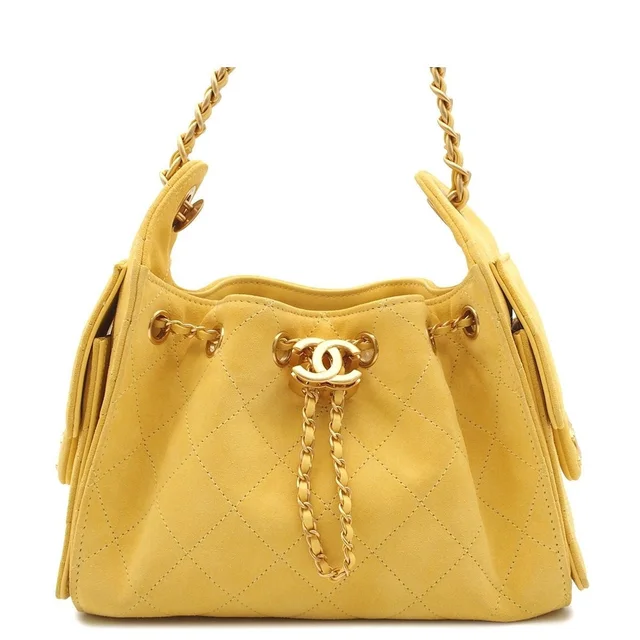 Chanel Shoulder Bag 25 Yellow Gold Suede in Yellow Suede from The Reluxe