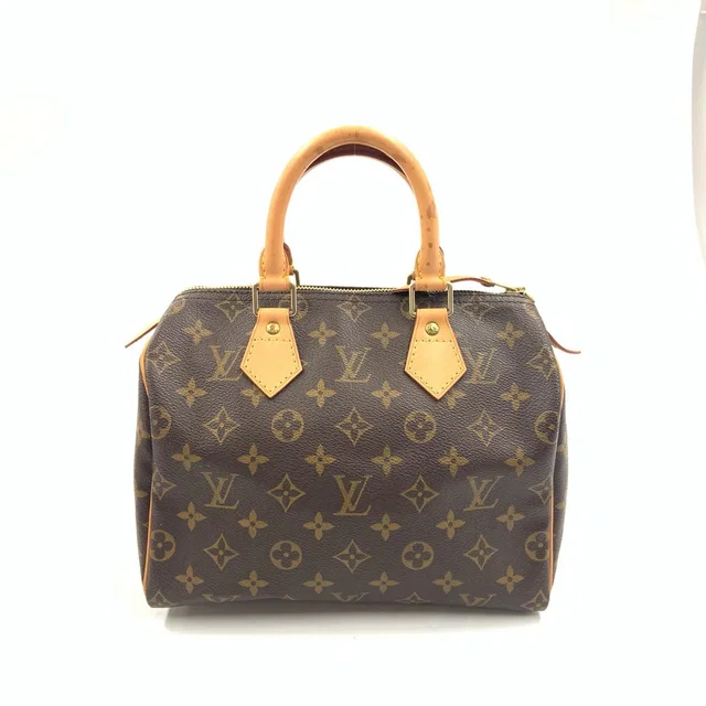 Louis Vuitton Monogram Speedy 25 Handbag Brown in Brown Coated canvas from The Reluxe
