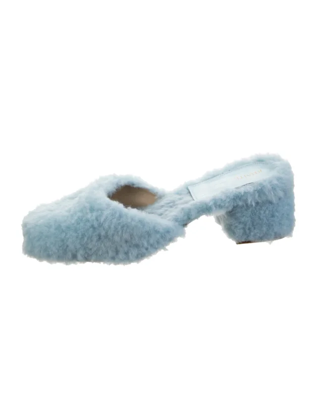 Khaite Shearling Mules in blue from The RealReal