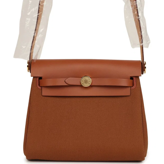 Hermès Herbag Zip 20 Mini Fauve Toile H Canvas and Vache Hunter Gold Hardware in Canvas from Madison Avenue Couture