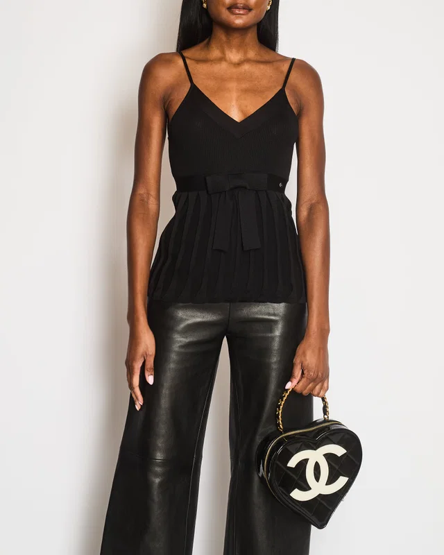 Chanel Black Silk Ribbed Sleeveless Top with Pleats and Front Bow Detail and Black and White Logo… in Black Silk from Sellier