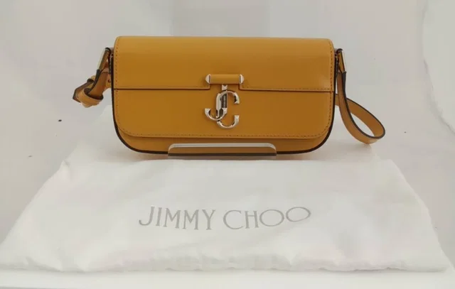 Jimmy Choo Varenne Mini Leather Shoulder Bag Sunflower/Light Gold Logo Internal Pocket in Orange Leather from Oxfam Online Shop