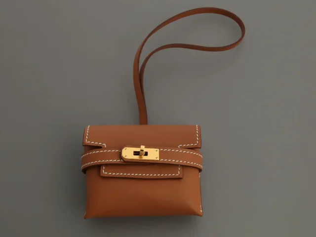 Hermès Gold Swift Kelly Festival Bag Charm in Gold Swift leather from Ann's Fabulous Finds, photo 2 of 6