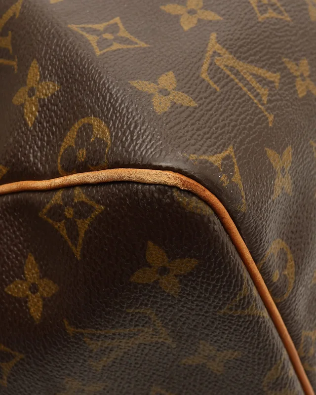 Louis Vuitton Monogram Keepall 55 Weekend Bag in Coated canvas from A Retro Tale, photo 9 of 12
