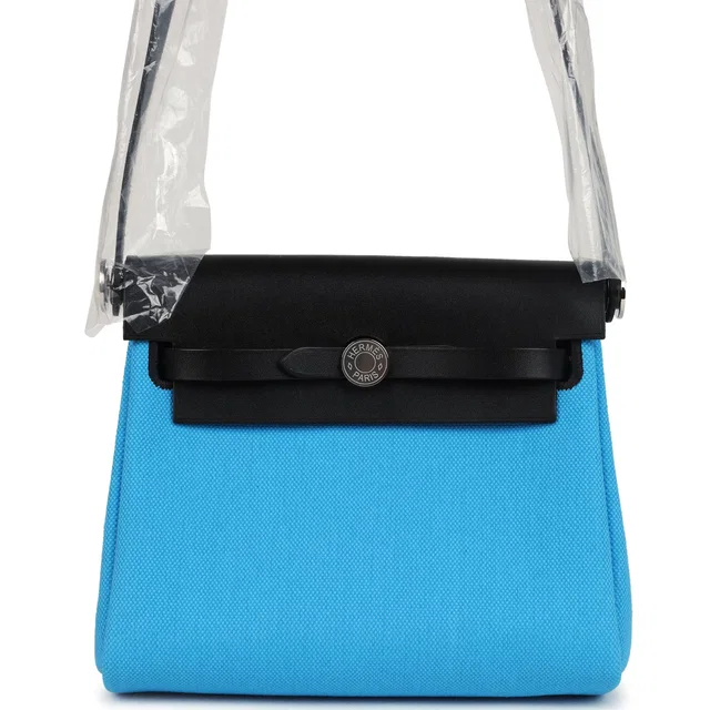 Hermès Herbag Zip 20 Mini Bleu Riviera Toile H Canvas and Black Vache Hunter Palladium Hardware in Black Canvas from Madison Avenue Couture