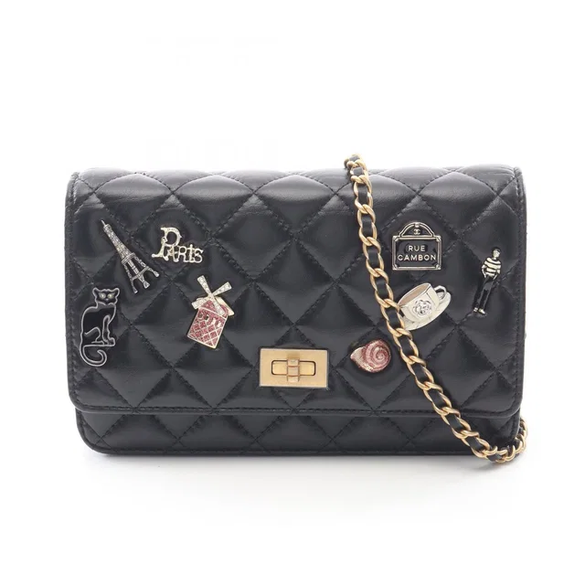Chanel Shoulder Bag Quilted 2.55 Iconcharm Black Lambskin Chain Wallet in Black Lambskin from The Reluxe
