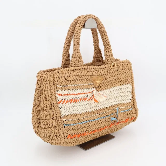 Prada Copy Raffia Basket Tote Bag in Raffia from The Reluxe