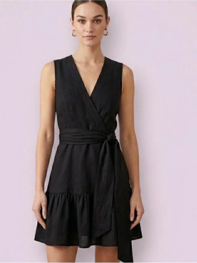 Christian Lacroix Sleeveless Linen Blend Wrap Mini Dress in black from Poshmark