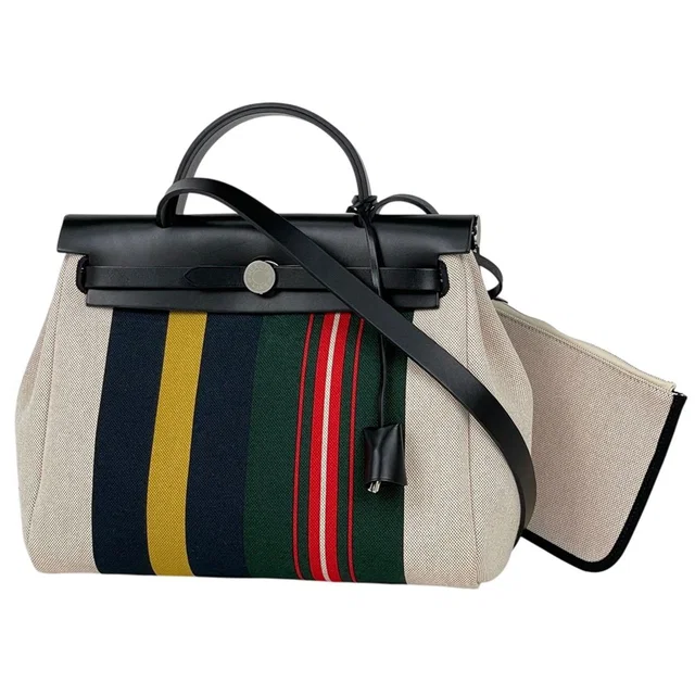 Hermès Herbag Zip 31 Retourne Lacquer Handbag 2-Way Rayeur Toile H Natural in Beige from The Reluxe