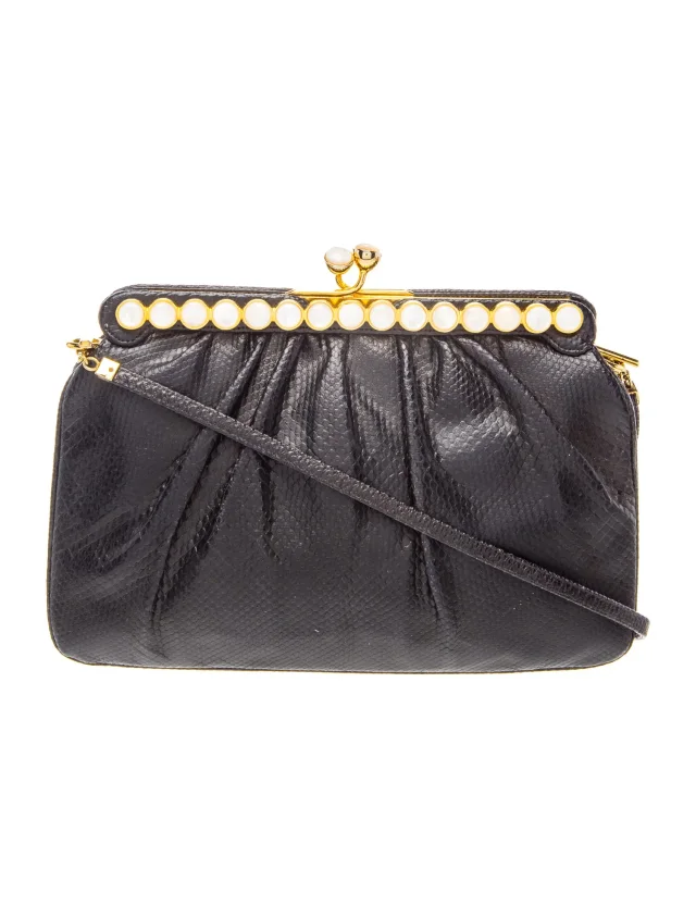 Judith Leiber Leather Clutch in black Leather from The RealReal