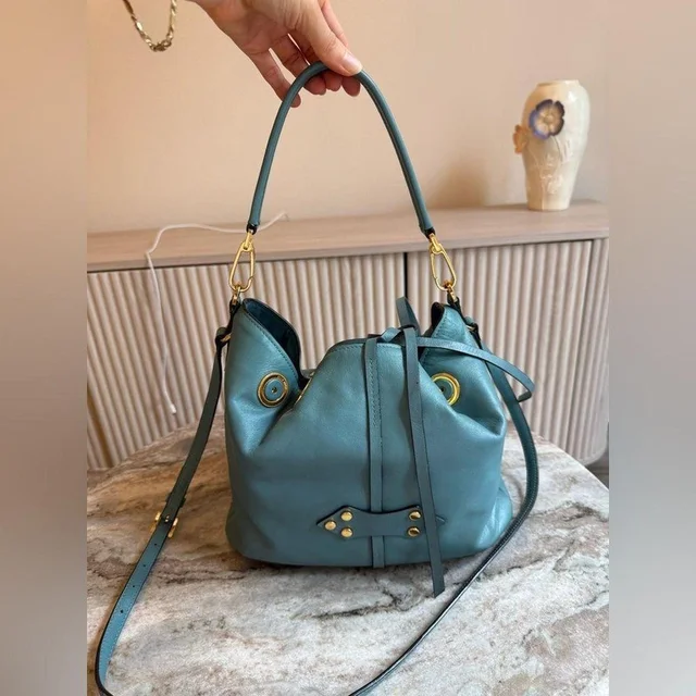 Miu Miu Women's Shoulder bags - Blue/Gold in blue|gold from Depop, photo 1 of 1