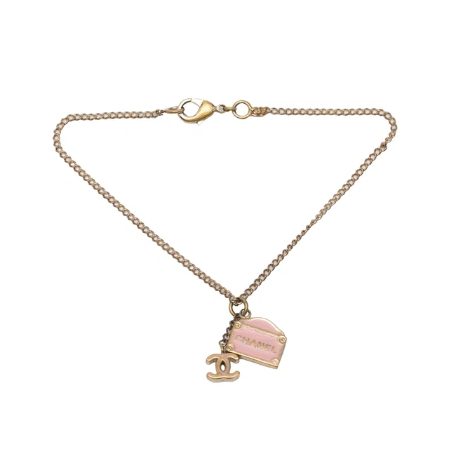 Gold Chanel CC Gold Plated and Enamel 31 Rue Cambon Charm Bracelet in Gold from Designer Revival