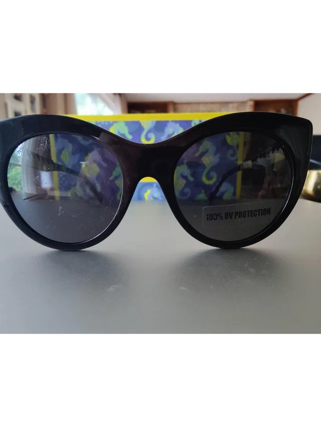 Tod's To 288 Women's Sunglasses in black from Poshmark