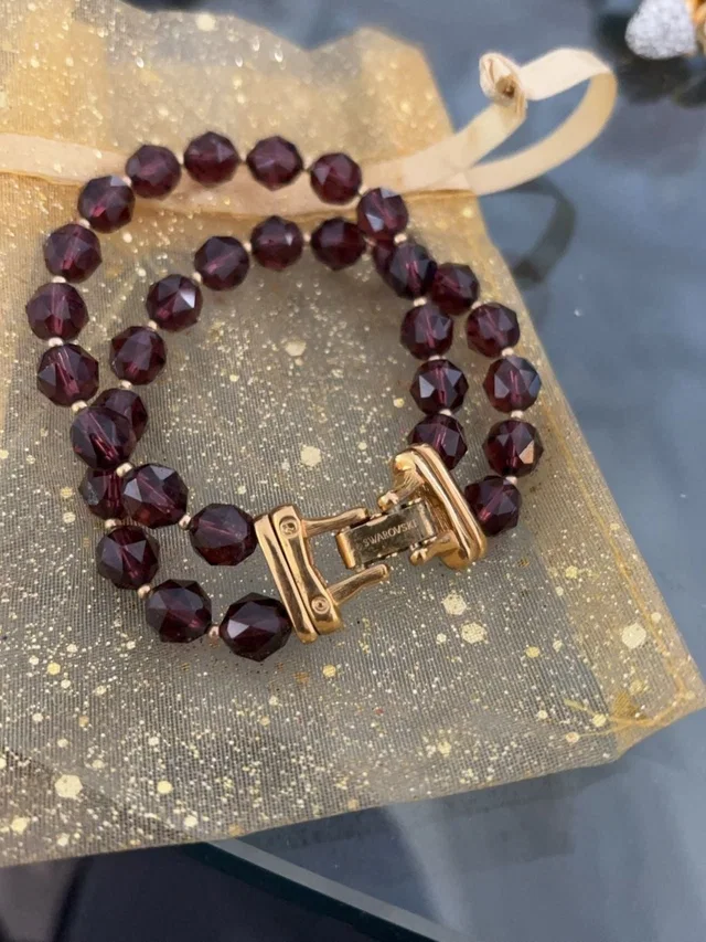 Signed Swarovski Garnet Crystal Beads Bracelet in red from Poshmark