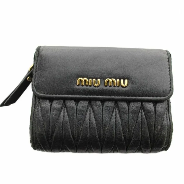 Miu Miu Matelasse Wallet Bifold Coin Purse Leather Black in Black Leather from The Reluxe