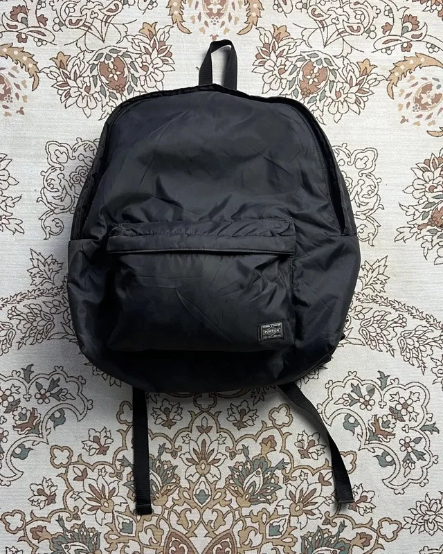 Comme des Garçons Porter X Comme De Garcons Logo Back Pack in black from Grailed
