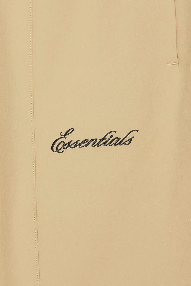 Fear of God ESSENTIALS Signature Track Pant in Dune, photo 6 of 6 from REVOLVE (Canada)