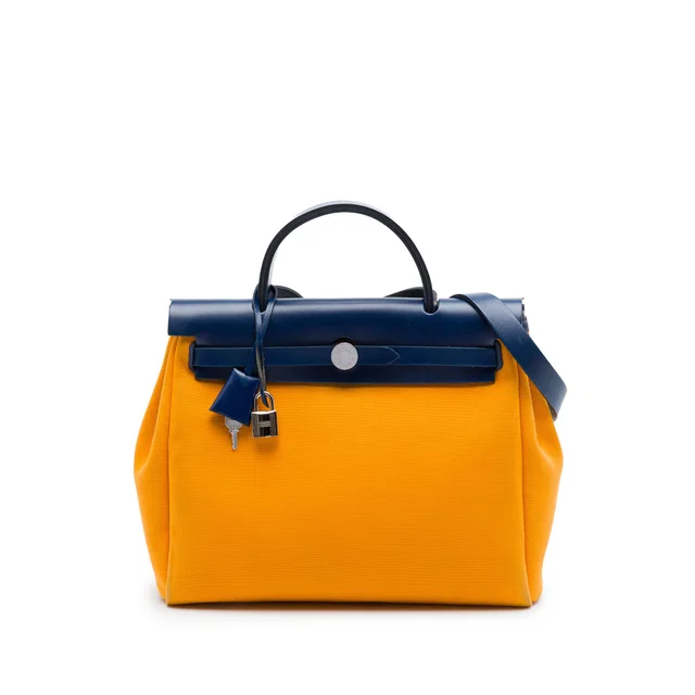 Orange Hermès Toile Herbag Zip Retourne Verso 31 Satchel in Orange Canvas from Designer Revival