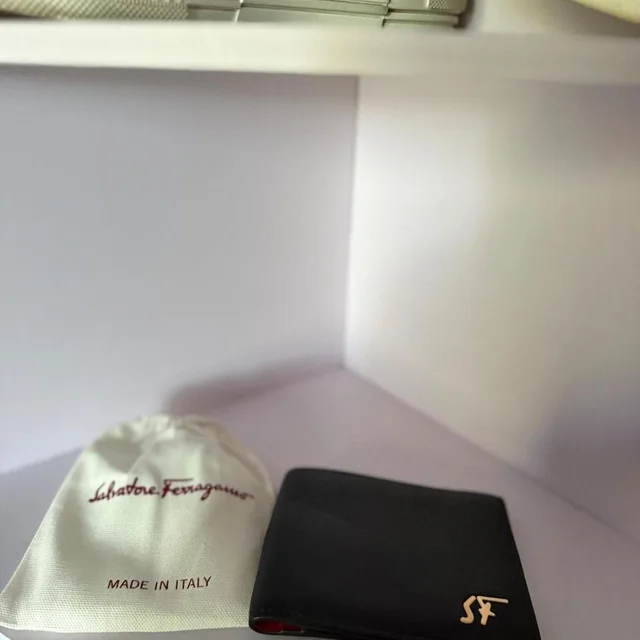 Ferragamo Men's Wallets - Gold/Black in gold|black from Depop, photo 1 of 1