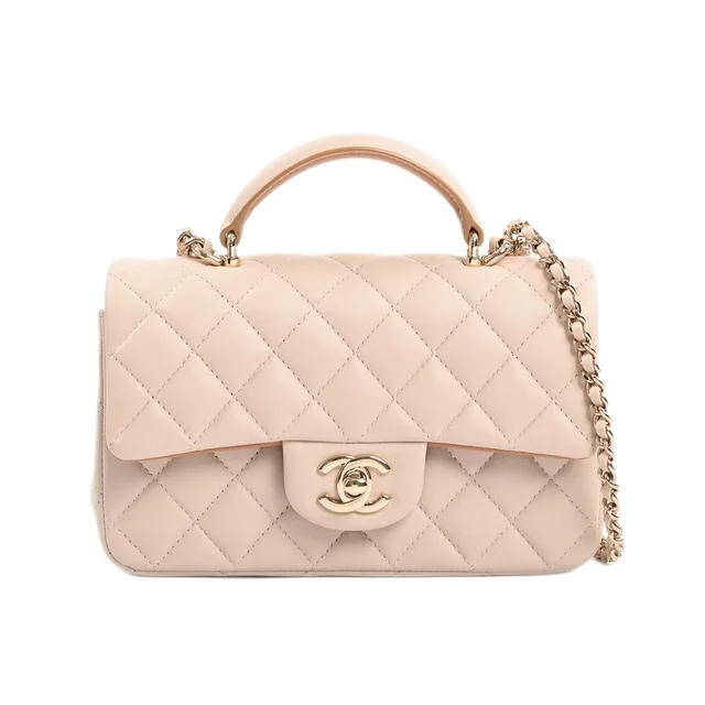 Chanel Handbag Top Handle Mini Flap Bag in Lambskin from The Reluxe