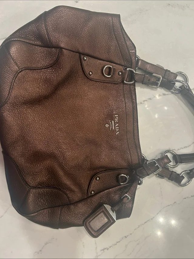 Prada Bronze Brown Pebbled Leather Shoulder Bag in silver|gray|brown|red Leather from Poshmark, photo 1 of 1