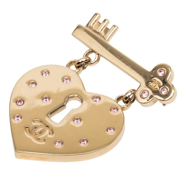 Gold Chanel CC Gold Plated Strass Heart Lock and Key Brooch in Gold from Designer Revival