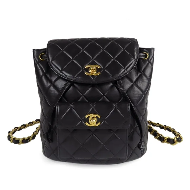 Chanel Backpack Black Gold Lambskin Quilted Dumas Chain Vintage in Black Lambskin from The Reluxe