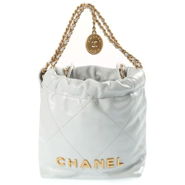 Chanel 22 Mini Handbag Chain Shoulder 2-Way Drawstring Bag Calfskin Gold Gray in Grey Calfskin from The Reluxe