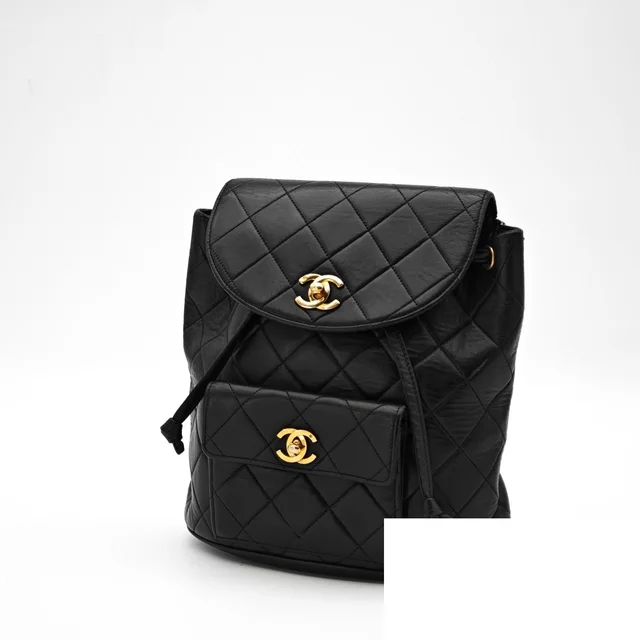 Chanel Quilted Backpack Flap Black Key in Black Leather from The Reluxe