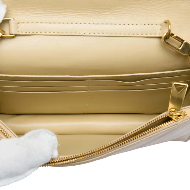 Bottega Veneta Mini Calfskin Intrecciato Pleated Cassette Crossbody in Beige Calfskin from Designer Revival, photo 4 of 5