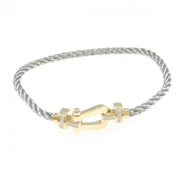 FRED force 10 bracelet in 750 yellow gold/stainless steel from KOMEHYO