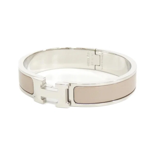 Hermès Clic H PM Bracelet from The Reluxe