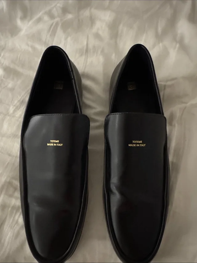TOTEME Leather Slip-On Loafers With Gold Stamp in black Leather from Poshmark