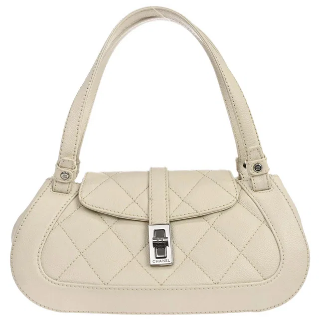 Chanel 2005-2006 Ivory Caviar Skin Mademoiselle Lock Handbag in White Caviar leather from AMORE Vintage Tokyo