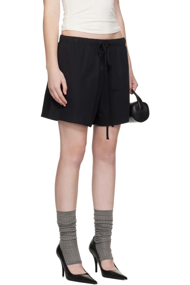 Fear of God ESSENTIALS Black Soccer Shorts, photo 2 of 4 from SSENSE