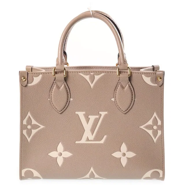 Louis Vuitton Monogram Giant Empreinte On The Go PM Tourterelle Cream 2-Way in White Leather from The Reluxe