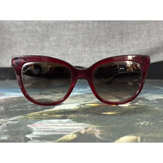 Versace Women's Sunglasses - Brown in red|brown from Depop, photo 1 of 1