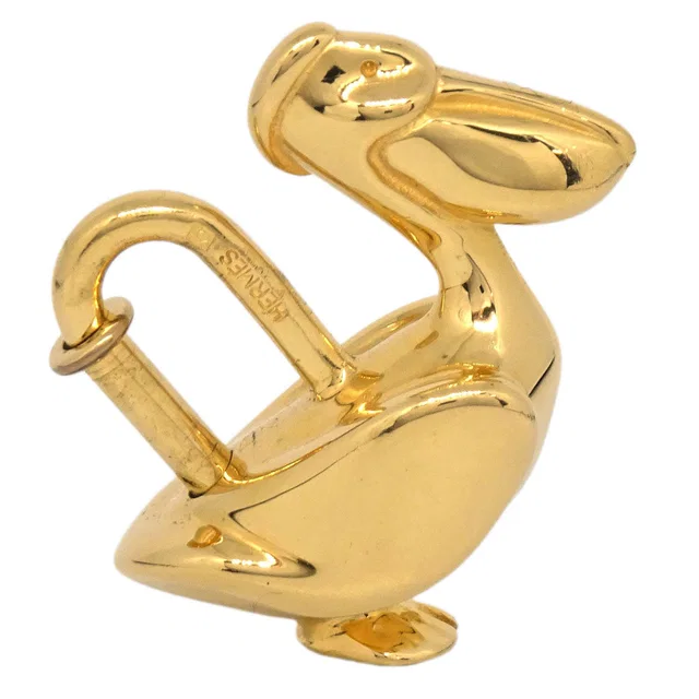 Hermès Pelican Motif 1992 Limited Cadena Padlock Gold Bag Charm in Gold from AMORE Vintage Tokyo