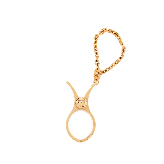Hermès Filou Glove clip rose gold tone in Pink from EMIER