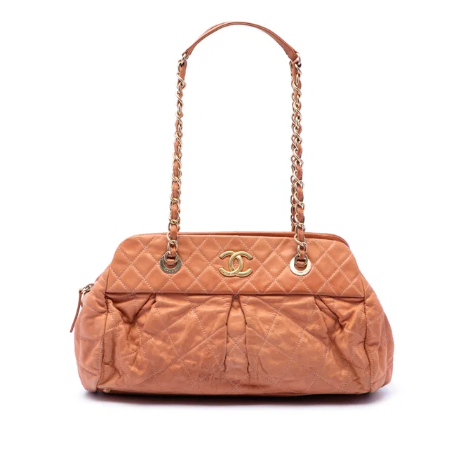 Orange Chanel Quilted Iridescent Calfskin Chic Quilt Bowling Bag in Orange Calfskin from Designer Revival