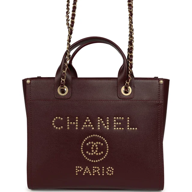 Chanel Small Studded Deauville Shopping Tote Burgundy Caviar Brushed Gold Hardware in Burgundy Caviar leather from Madison Avenue Couture