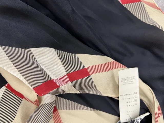 Burberry Triangle 100% Silk Scarf in 100% Silk from Reowned, photo 3 of 5