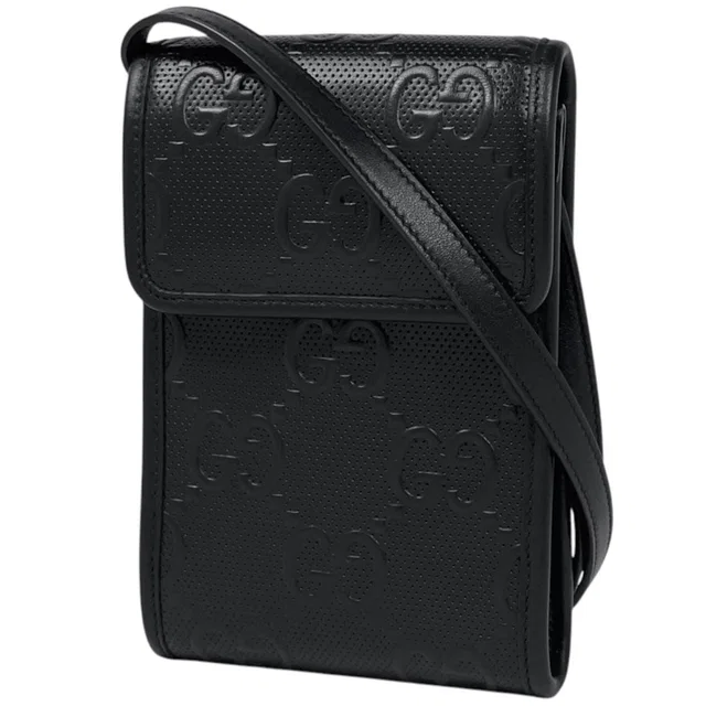Gucci Shoulder Bag GG Embossed Mini Leather Black in Black Leather from The Reluxe