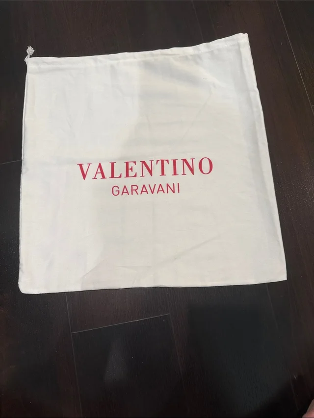 Valentino Garavani Dust Bag in red|white from Poshmark